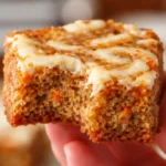 irresistibly indulgent carrot cake cream cheese bars with crunchy walnuts and fragrant spices topped with creamy frosting