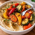 roasted veggie and hummus bowl with colorful vegetables creamy hummus and quinoa healthy easy meal